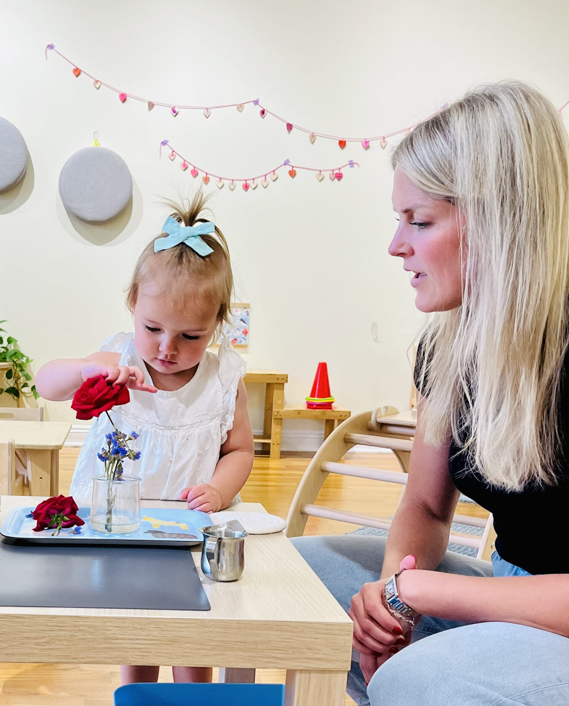 toddler arranging flowers toddler arranging flowers